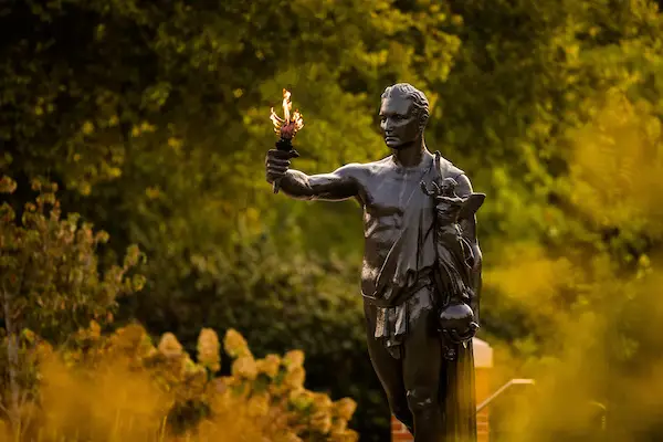 UT's torchbearer statue carries a flame in the early morning. 